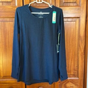 We Wander long sleeve shirt with thumb holes and pocket.